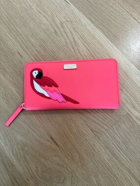 kate spade hot pink parrot zip-around wallet with gold logo